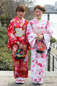 Japanese Ladies in red and pink colourful Kimono