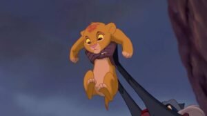 Simba being lifted up in the lion king movie
